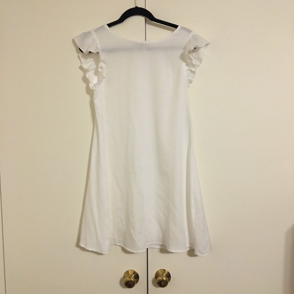 white ruffle sleeve dress